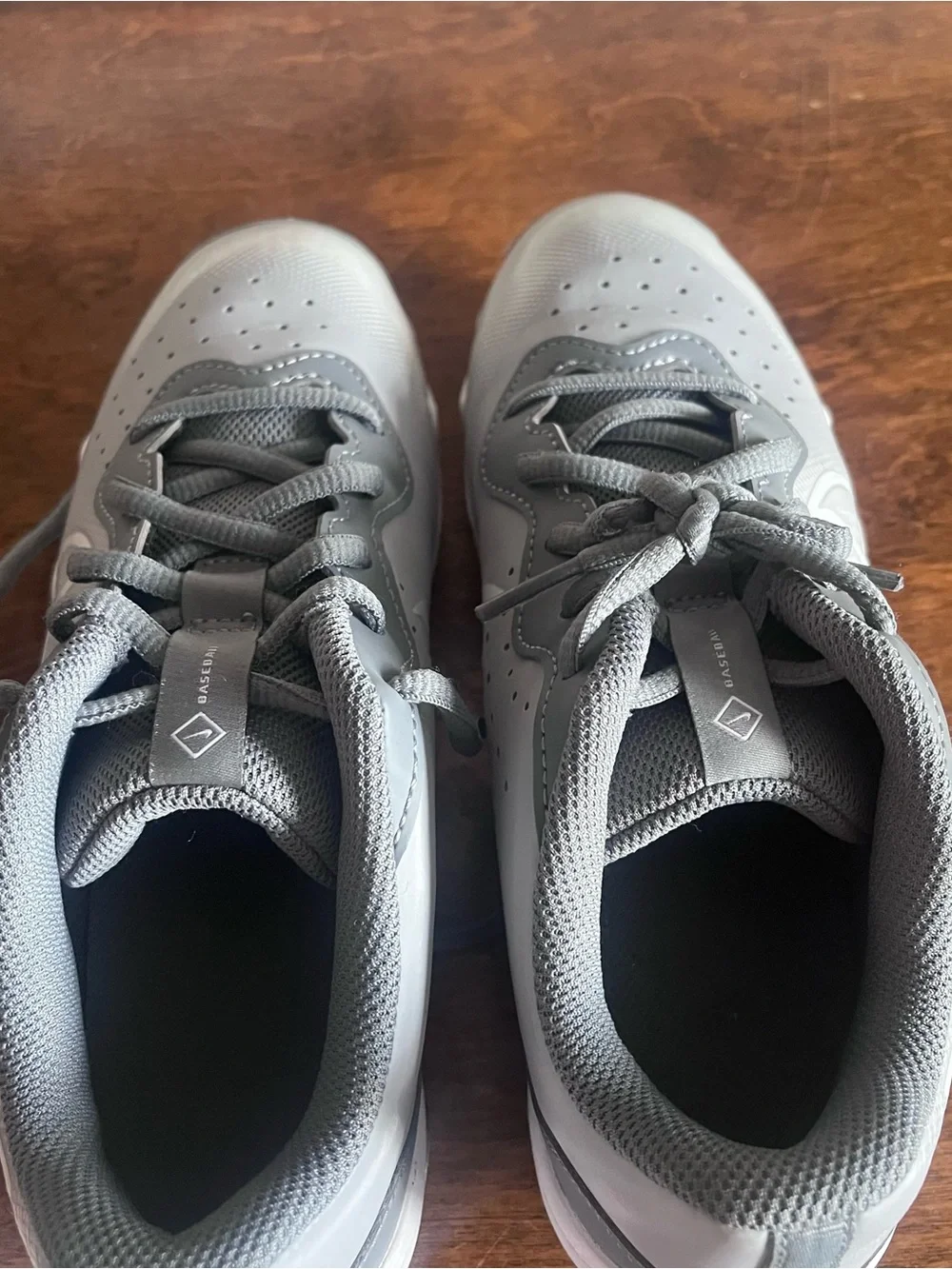 Nike Gray Youth Cleats with White Swoosh